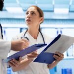 imageye___-_imgi_32_team-doctors-comparing-test-results-healthcare-records-office_482257-115903